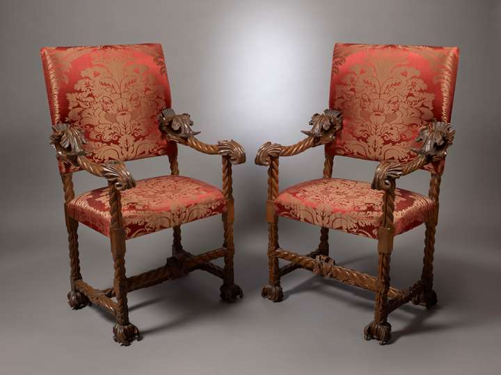 A Pair of Baroque Carved Armchairs